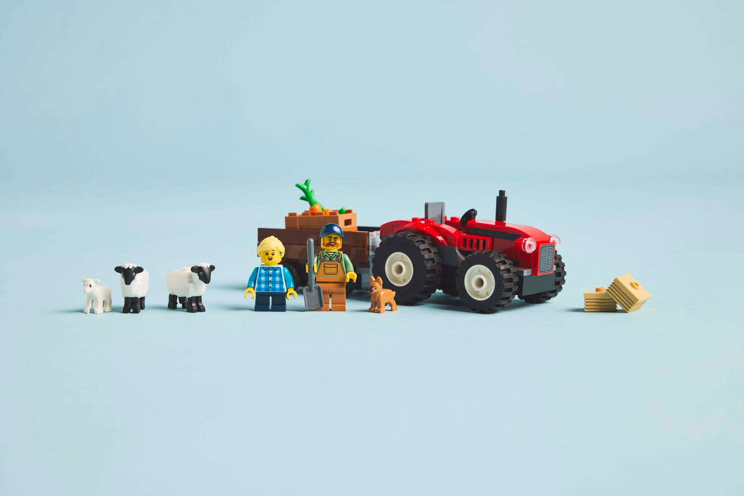 Конструктор Lego City Червоний фермерський трактор із причепом і вівцями фото №5