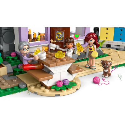 Конструктор Lego Friends Будиночок і квітник бджолярів (42669) фото №5